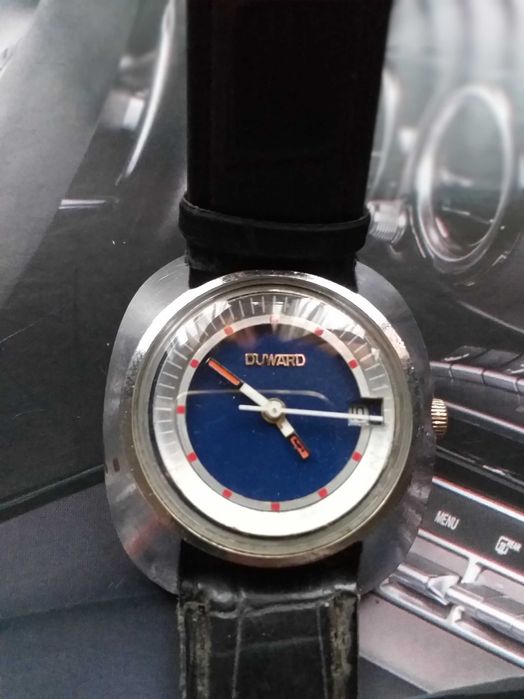 relogio duward corda manual