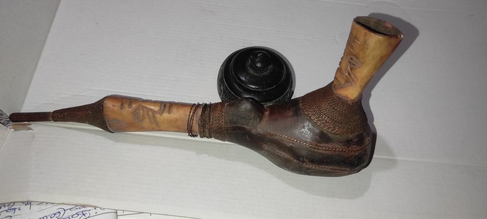 Cachimbo de côco e osso