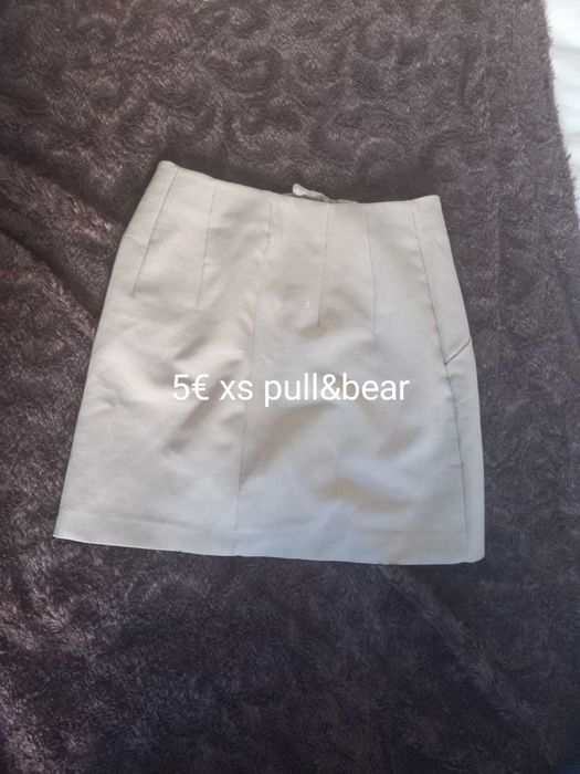 Roupa mulher e mala original  marca prada custa 1.200