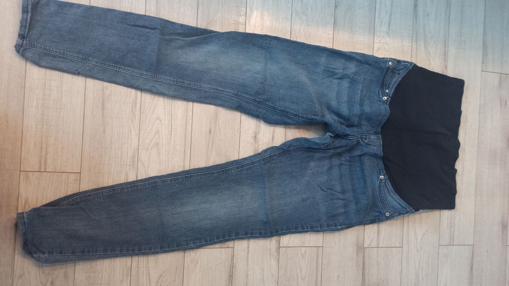 Niebieskie spodnie jeansowe ciążowe. Rozm. 44 H&M