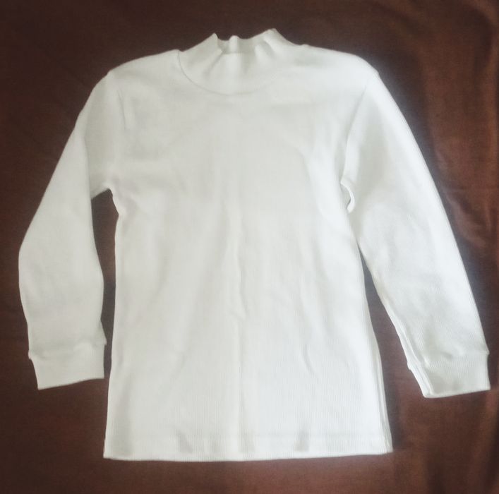 Білий гольф (водолазка) на зріст 110, 146