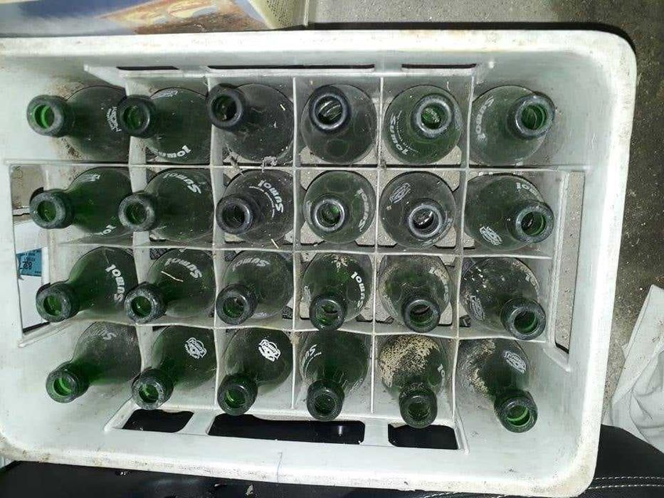 Grades e garrafas antigas de Sumol