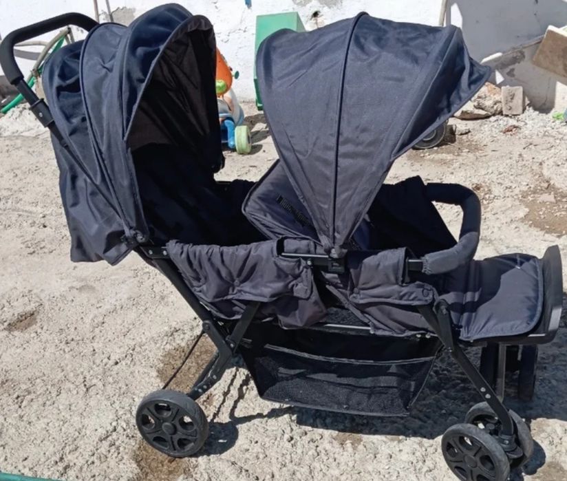 Carinho de bebe de gêmeos