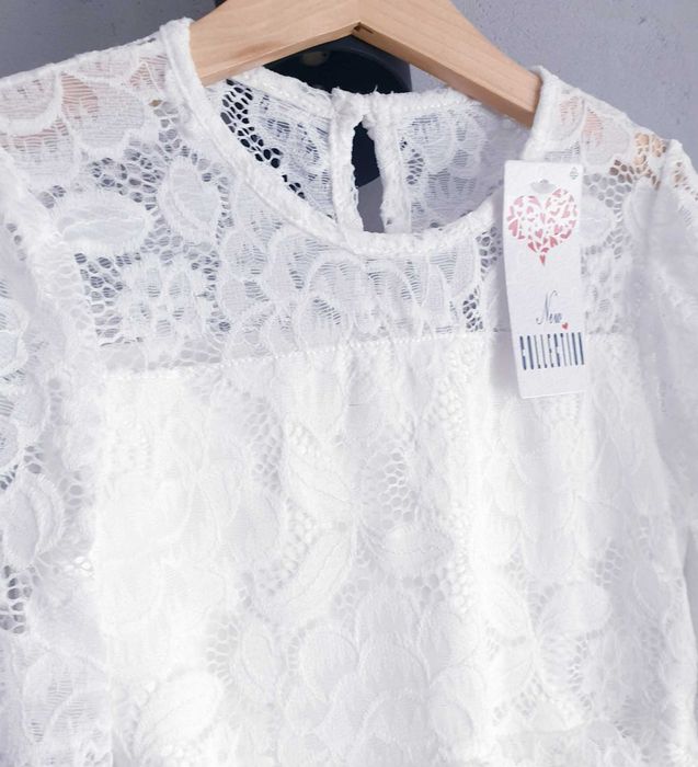 Nowa elegancka koronkowa sukienka 134 cm