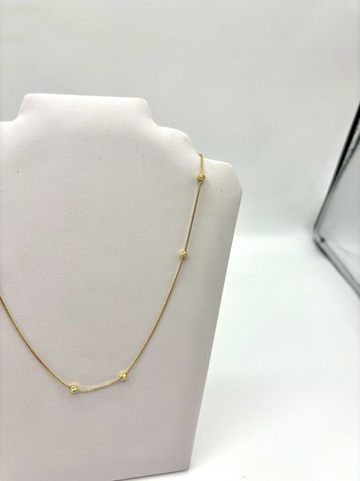 Złoty naszyjnik z kulkami rychomymi regulowany