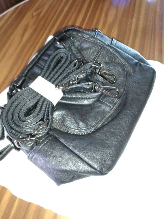 Carteira/ mochila de senhora nova