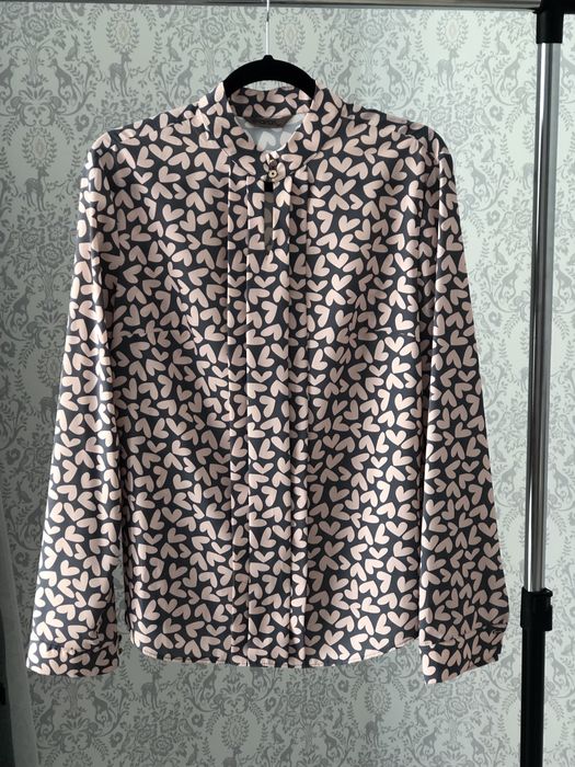 Жіноча блузка в стані нової речі.