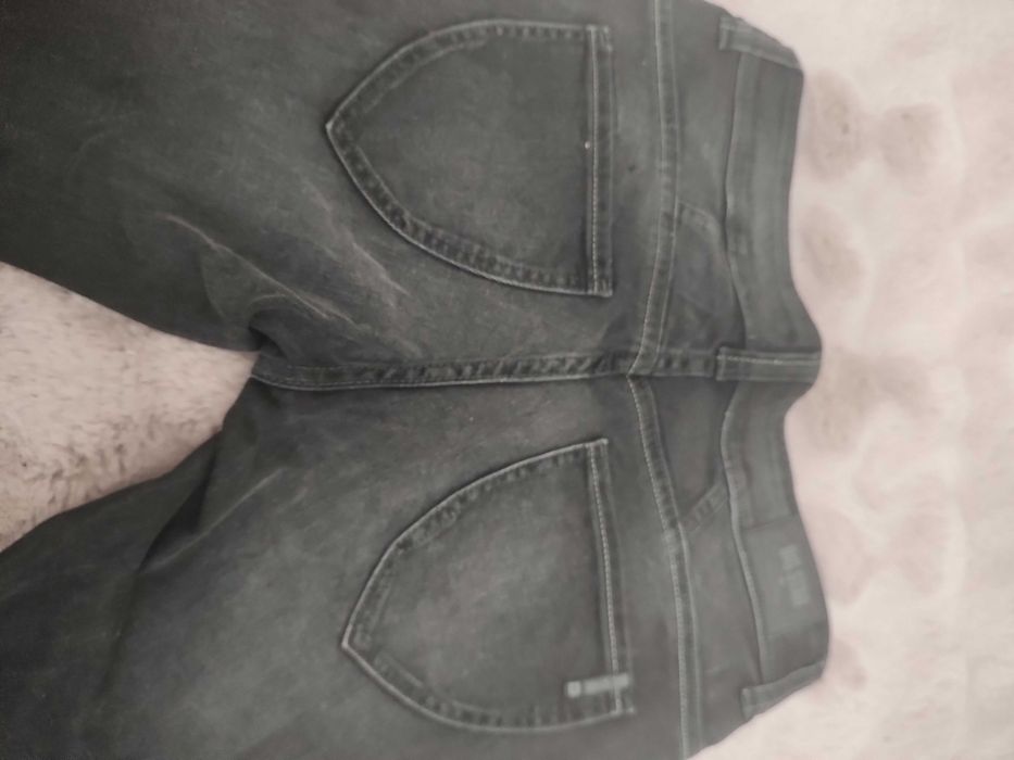 czarne jeansy W 27 L 32