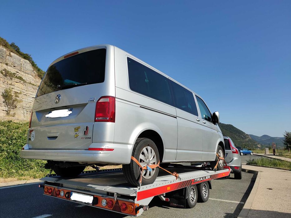 Transporte de carro, trator, furgão, caravana, motos.