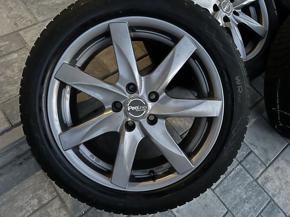 Felgi alu + opony zimowe Nokian 215/50 R17