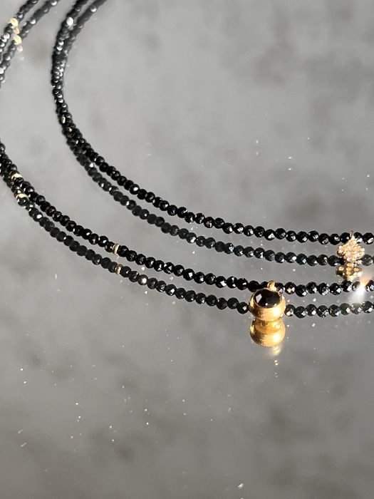 Чокери з чорного оніксу.