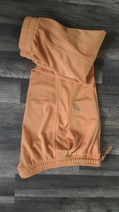 świetne deesowe spodnie PUMA