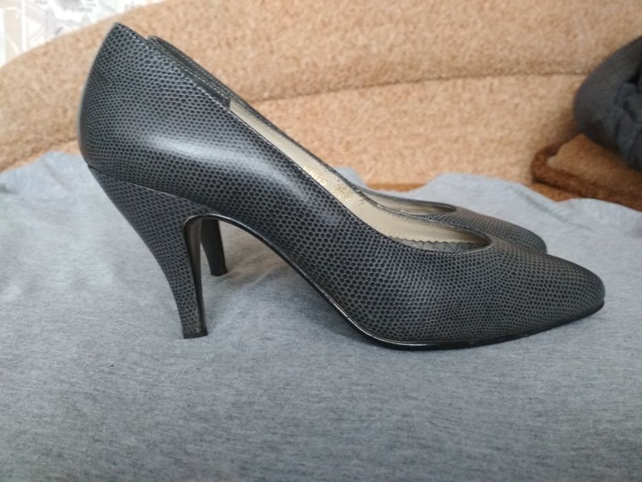 Новые кожаные туфли