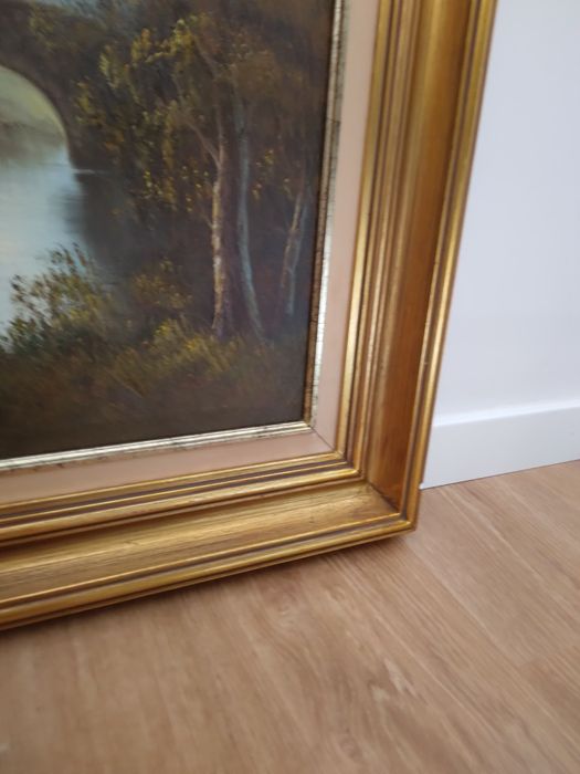 Quadro casa no lago com moldura banhada a ouro