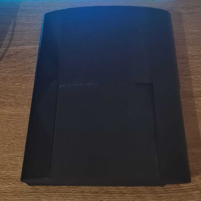 PlayStation 3 c/comando e jogos usada