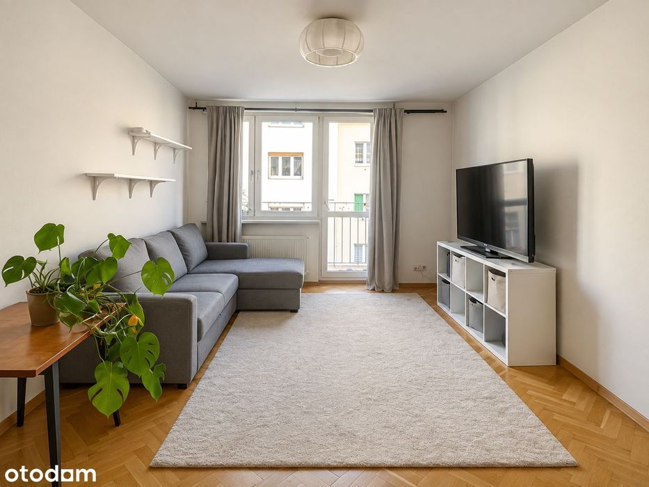 Cieplik, balkon, tramwaj i park "pod domem"