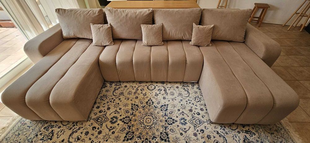Sofá cama em U em bom estado de conservação