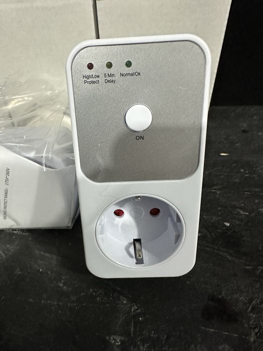Реле напруги в розетку 220v реле напряжения  розетка з таймером