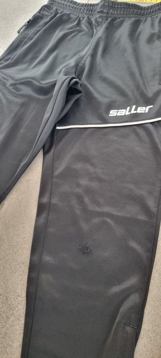 Saller spodnie pilkarskie 128 i getry Nike