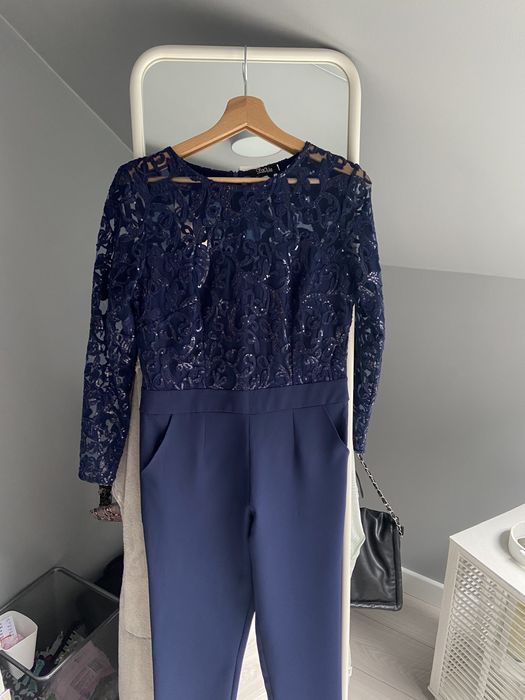 Kombinezon granatowy cekiny M nowy