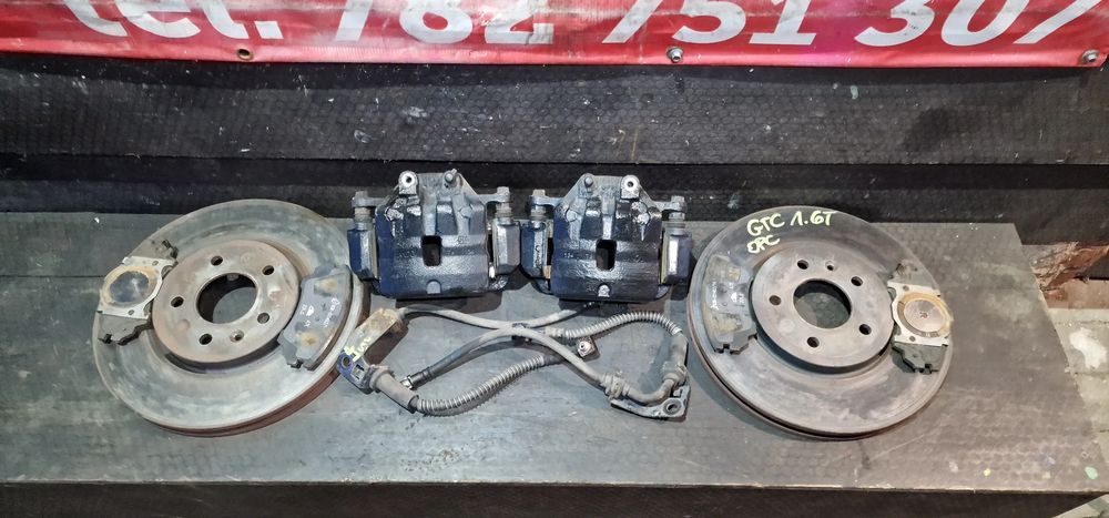 zaciski hamulcowe przednie+tarcze 321mm opel astra j gtc opc