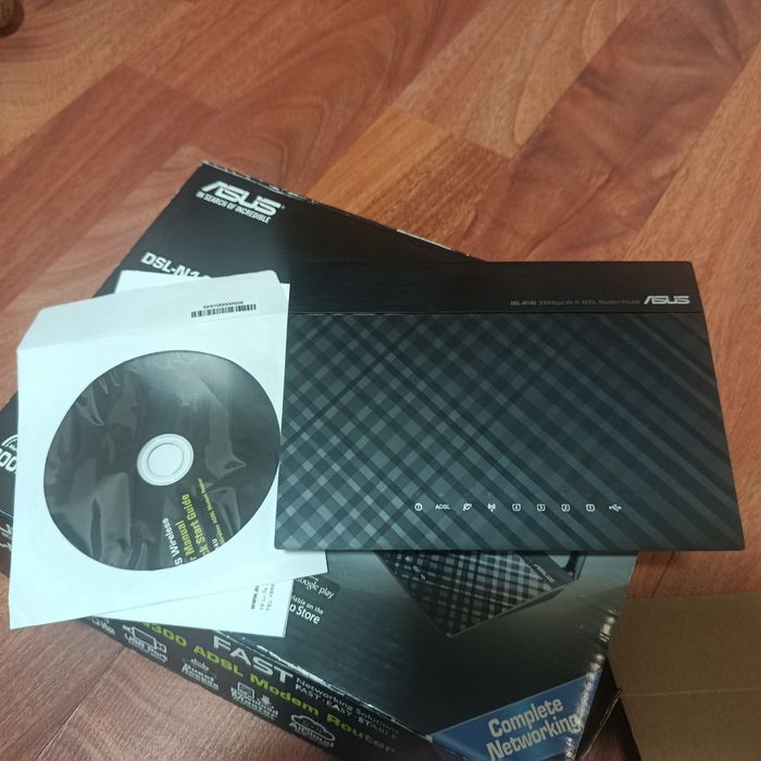 ADSL-модемом Asus DSL-N14U