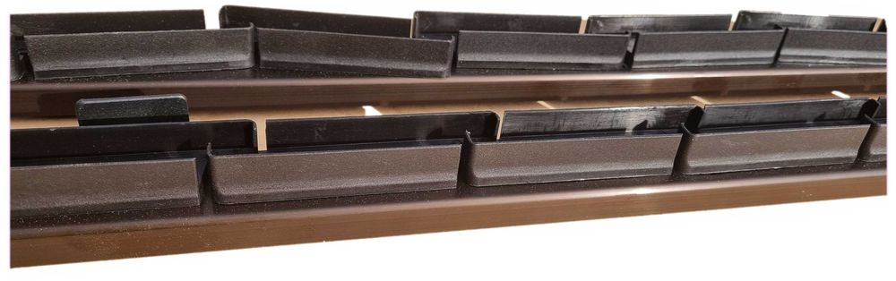 Aluminiowy system prowadzący żaluzji. Schutters