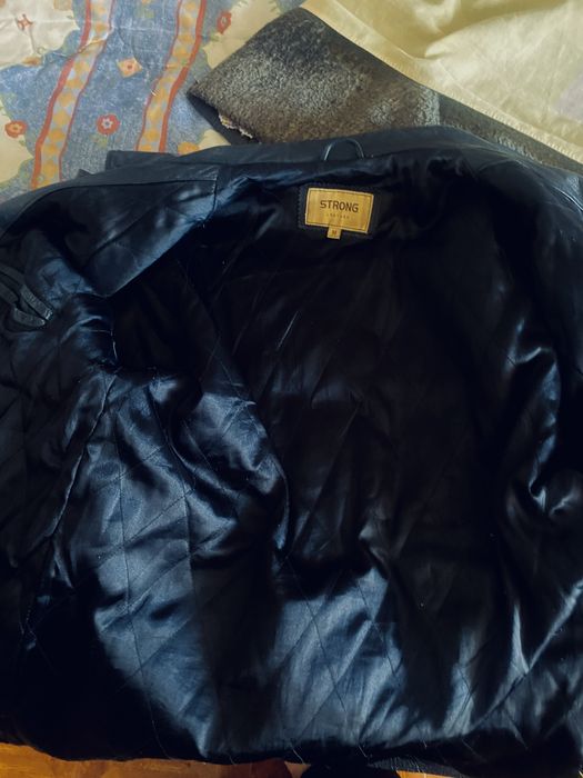 Casaco em couro verdadeiro