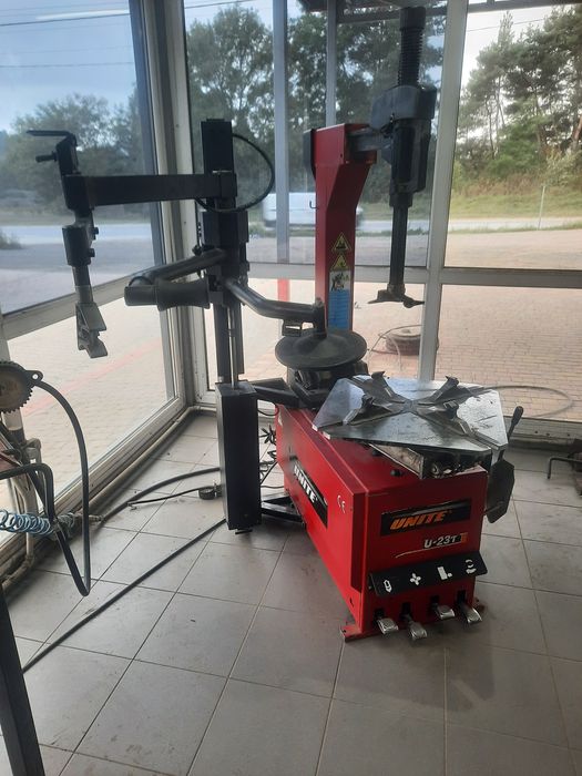 Шиномонтажний станок автомат з допоміжною рукою