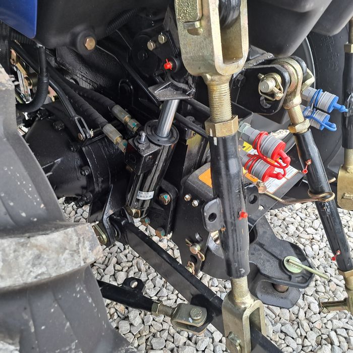 Міні трактор ДТЗ 5504НККз примусовим навісним механізмом