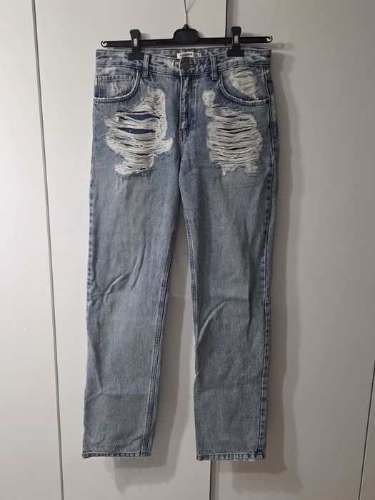 niebieskie jeansy z przetarciami Pull&Bear rozmiar 38