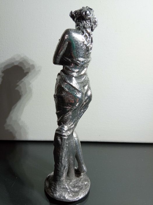Estatueta figura em Metal polido