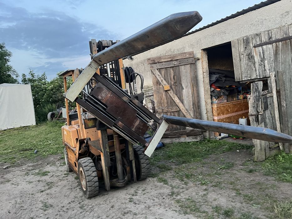 Widlak clark 2,5T,automat,widły obracane-rozsuwane,perkins 4cyl.