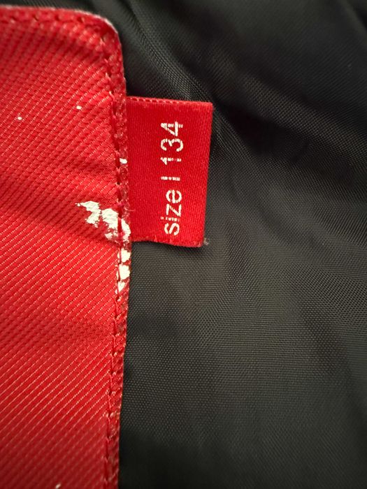 Puchowy kombinezon Reima - 134 cm