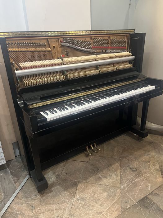 Piano vertical steinway modelo K