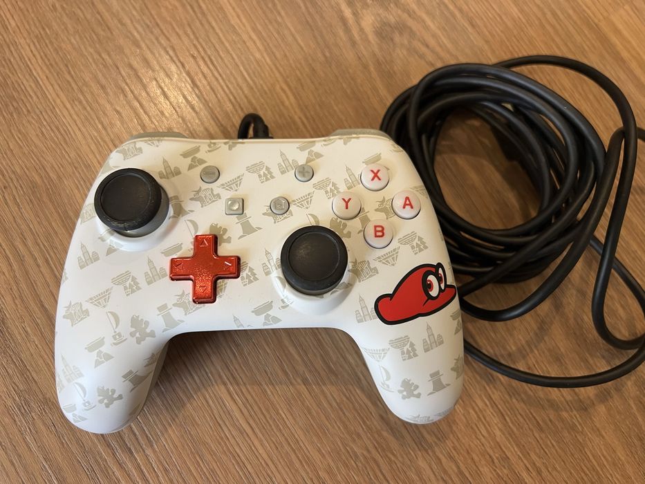 Nintendo Switch, remote and 3 games