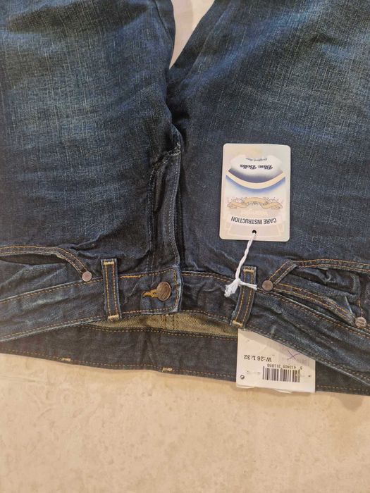 Nowe damskie spodnie jeansowe LEE dzwony rozmiar W26 L32