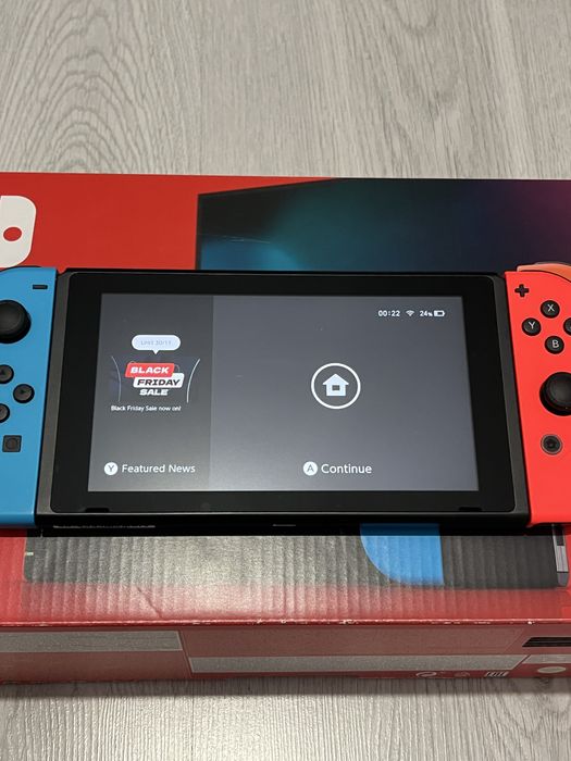 Zestaw Nintendo Switch + 2 gry + paletki
