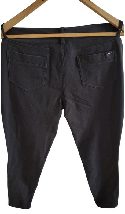 Markowe elastyczne spodnie jeans firmy Nike r 38 M czarne