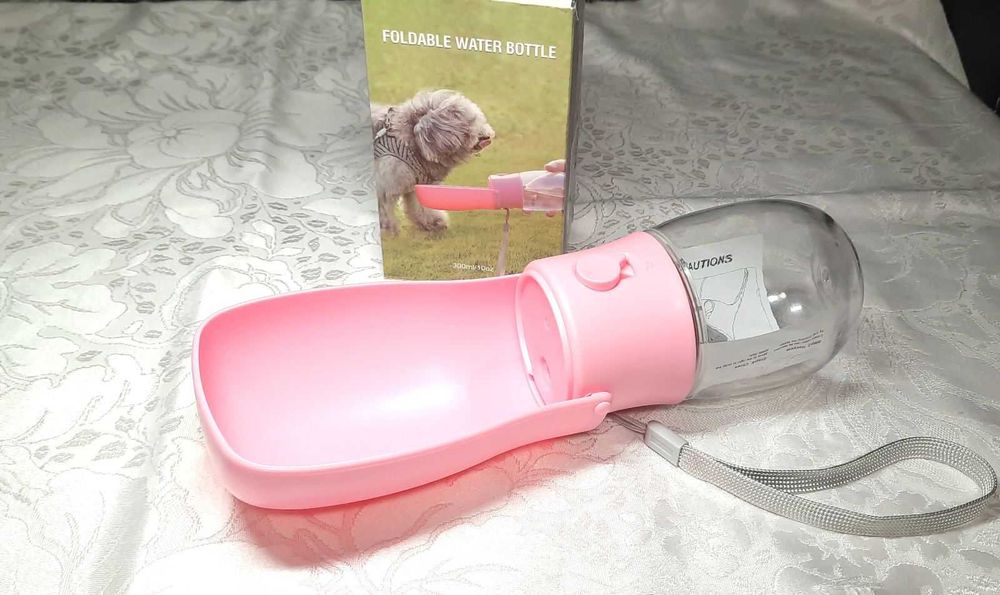 Портативна поїлка 300мл для собак з кнопкою блокування рідини, є нюанс