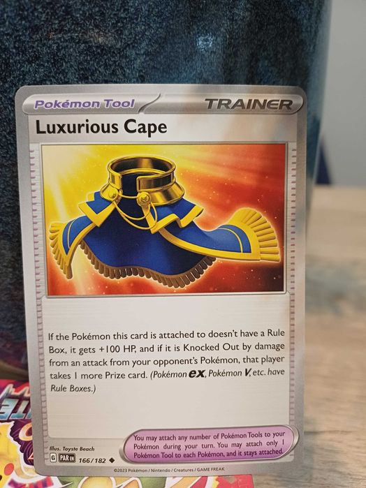 Carta Pokémon Luxurious Cape #166