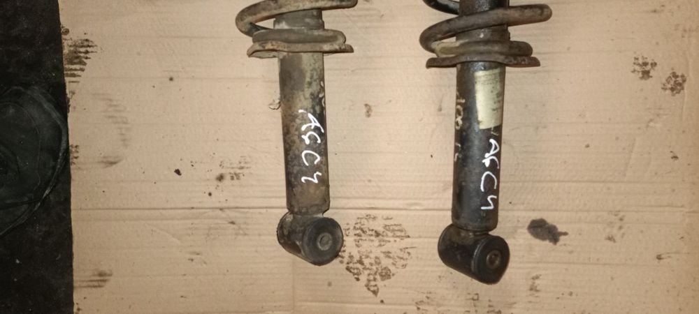 Amortyzatory sprężyny tył audi A6 C4