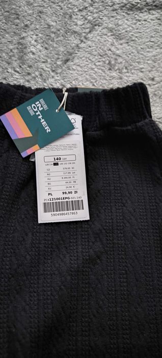 Nowe spodnie swetrowe coccodrillo r..140 szerokie nogawki slim