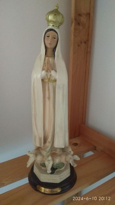 Figura de nossa senhora e sagrada família