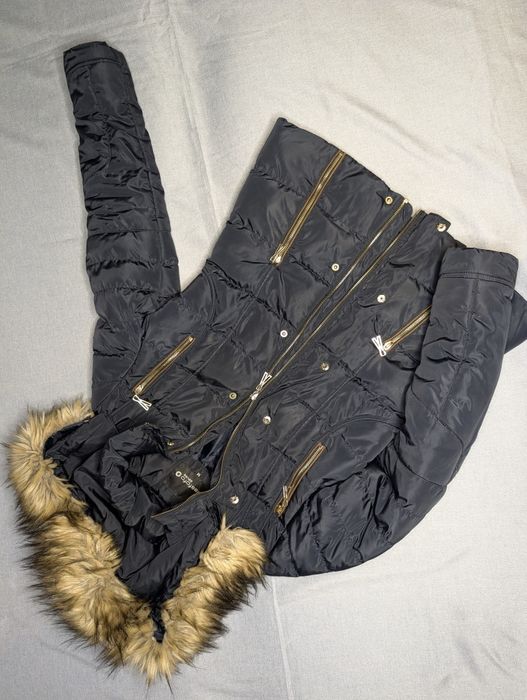 Zimowa kurtka z zamkiem do naprawy