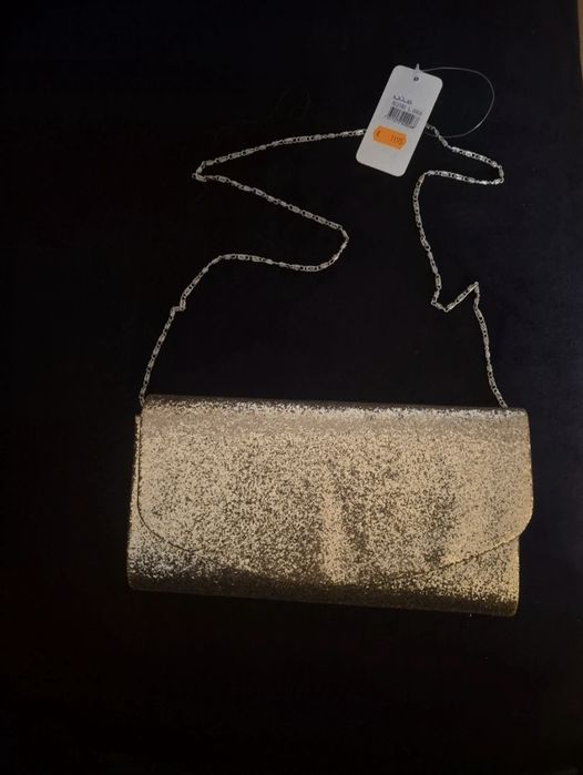 Mala dourada brilhantes