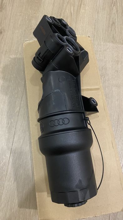 Кронштейн (корпус) масляного фільтра 2.5 vw 07K115397D / 07K115397Е