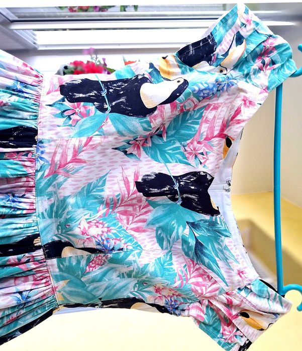 Bawełniana sukienka w kwiaty i tukany Hell Bunny