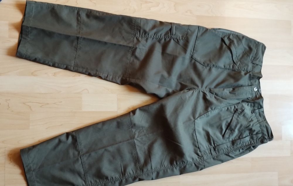 Spodnie trekkingowe Champion Wenlock® z wieloma kieszeniami są metki