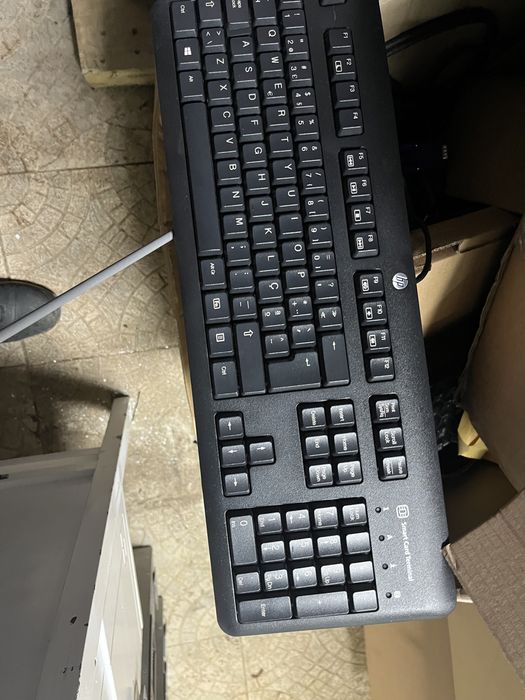 Teclados para computador com leitor